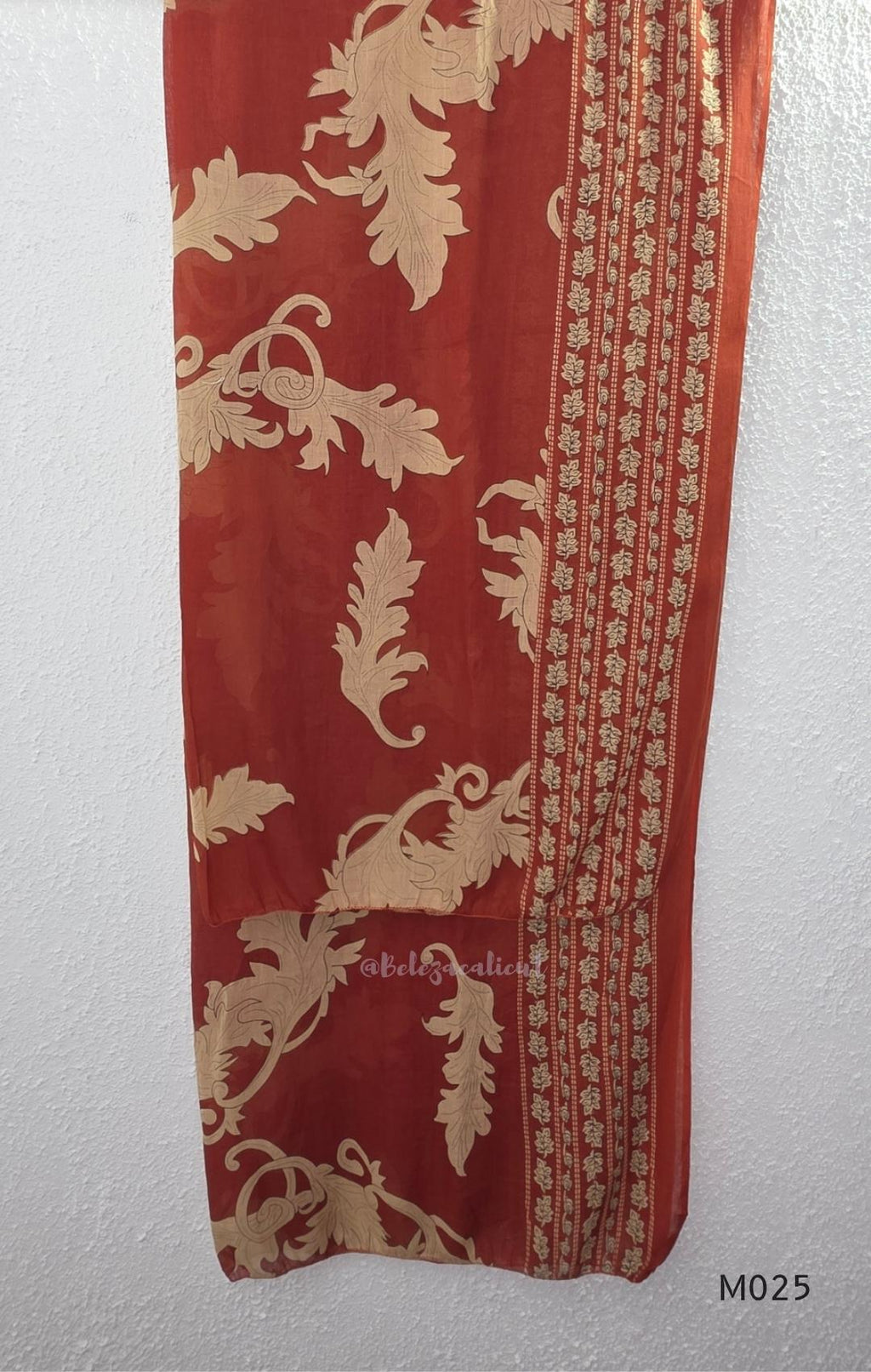 Rust cotton 3-piece ethnic set with beige leaf print, matching dupatta and printed pant. Comfortable ethnic wear for women in Calicut.