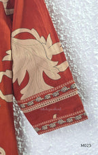 Rust cotton 3-piece ethnic set with beige leaf print, matching dupatta and printed pant. Comfortable ethnic wear for women in Calicut.