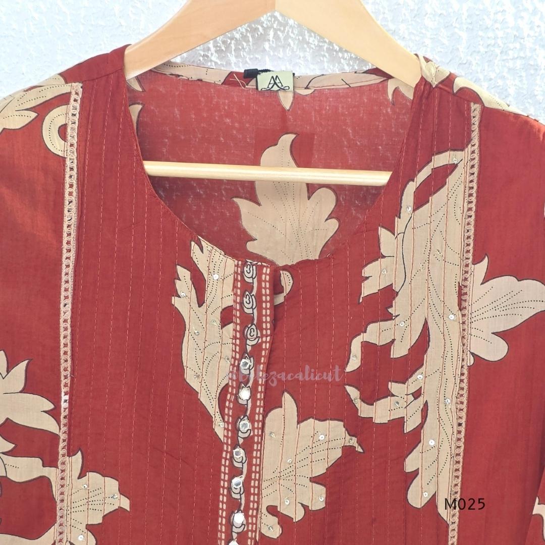 Rust cotton 3-piece ethnic set with beige leaf print, matching dupatta and printed pant. Comfortable ethnic wear for women in Calicut.