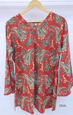 Rust red cotton short top with green and cream paisley print, sold as a top only.