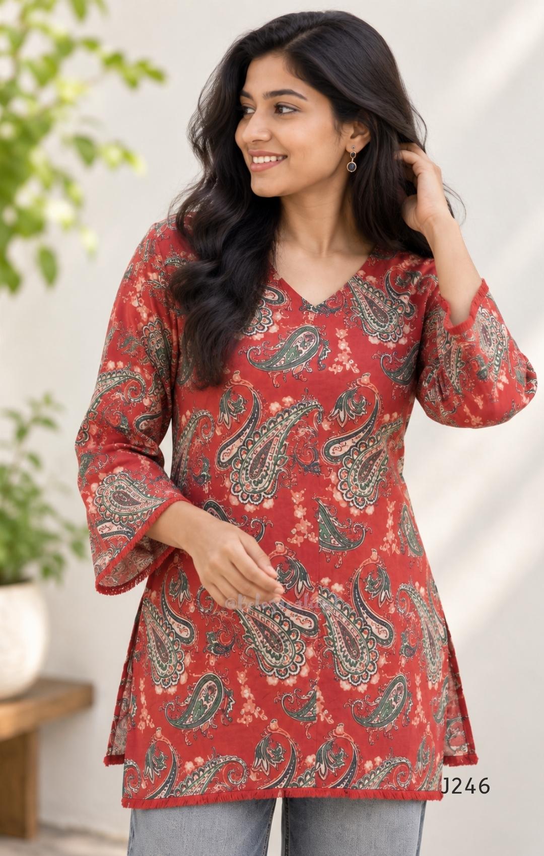 Rust red cotton short top with green and cream paisley print, sold as a top only.
