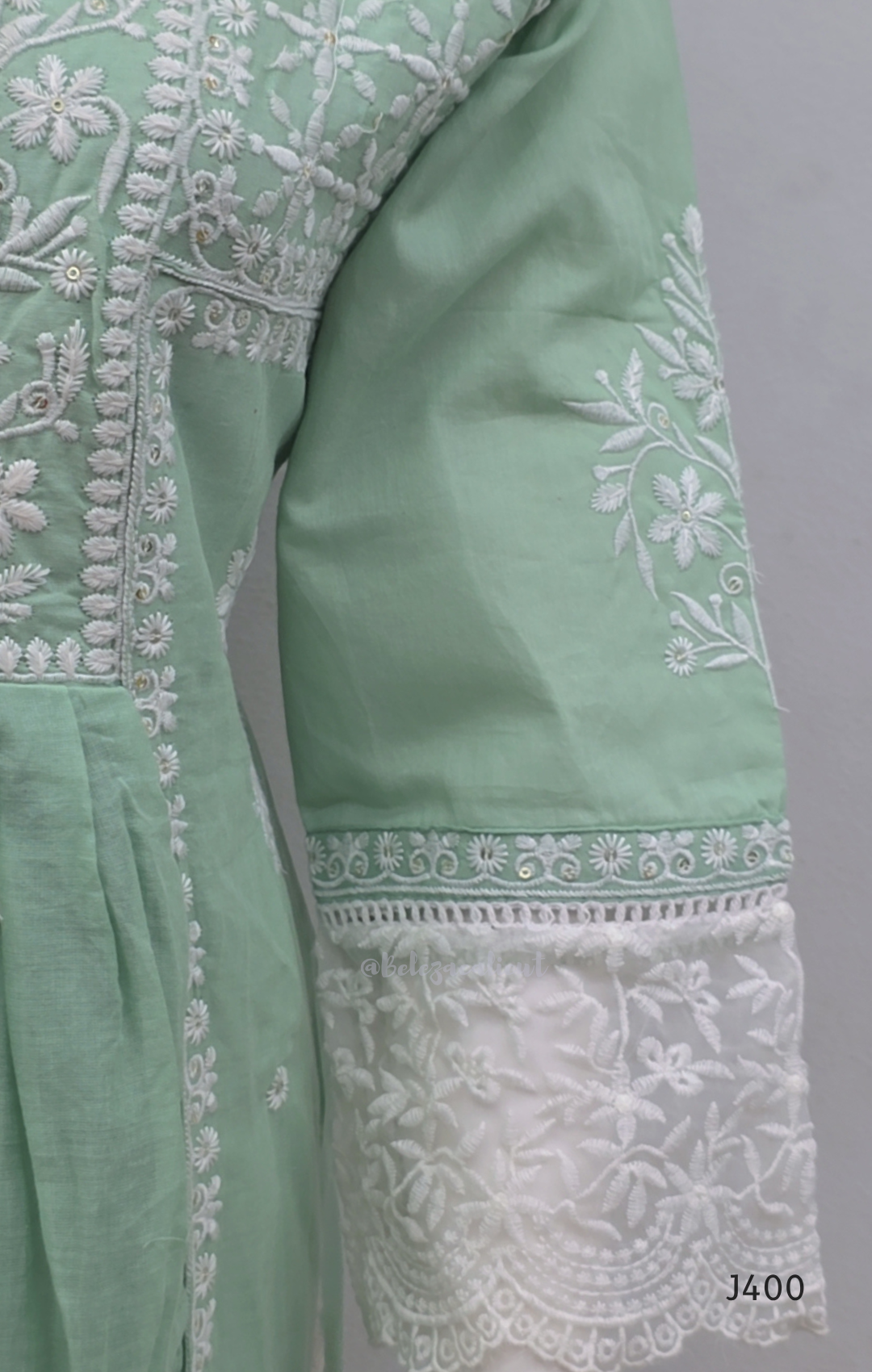 Sage green cotton churidar set with lining, white embroidery, lace border and matching dupatta. Available at Beleza Calicut