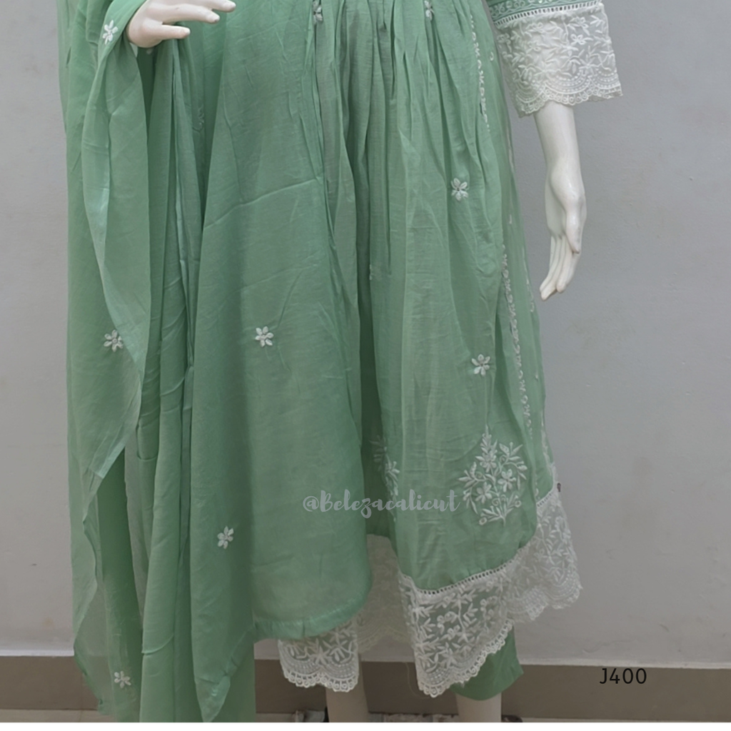 Sage green cotton churidar set with lining, white embroidery, lace border and matching dupatta. Available at Beleza Calicut