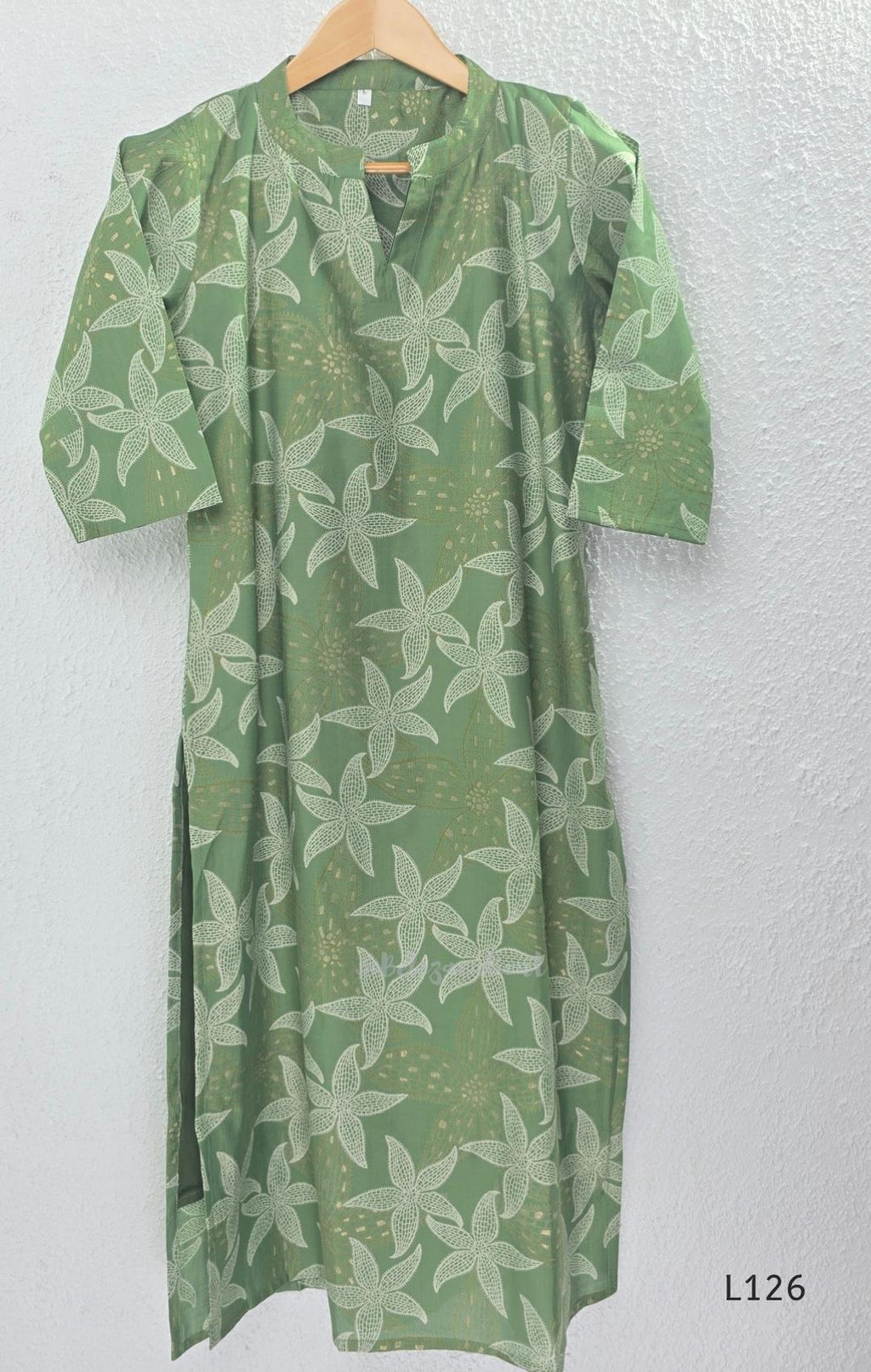 Sage green silk blend top and bottom coord set with cream floral print and gold-toned detailing.