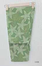 Sage green silk blend top and bottom coord set with cream floral print and gold-toned detailing.