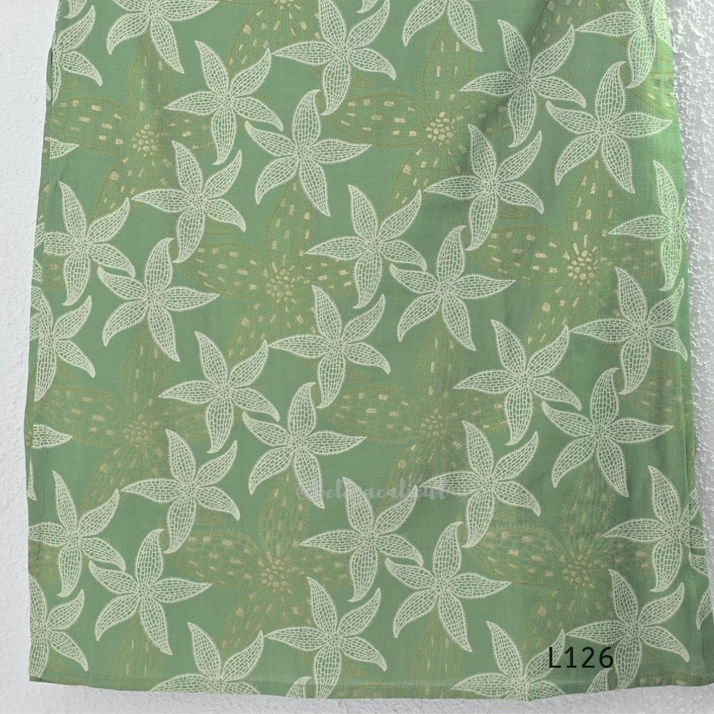 Sage green silk blend top and bottom coord set with cream floral print and gold-toned detailing.