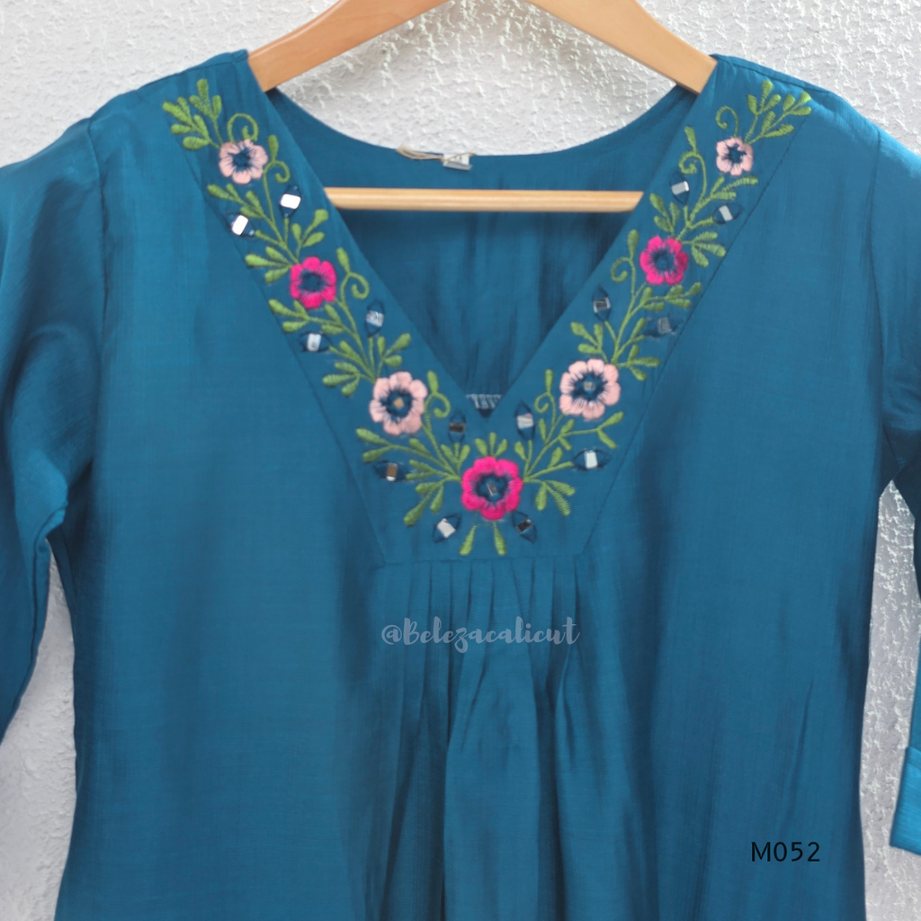 Silk blend 3-piece churidar set in teal, rani pink and rust shades with floral V-neck embroidery, printed dupatta and straight pant.