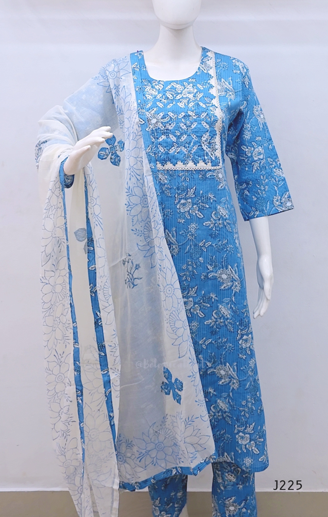 Sky blue premium kantha cotton churidar set with white floral print, applique yoke and cotton dupatta. Available at Beleza Calicut.