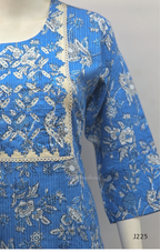 Sky blue premium kantha cotton churidar set with white floral print, applique yoke and cotton dupatta. Available at Beleza Calicut.