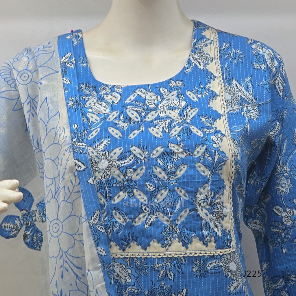 Sky blue premium kantha cotton churidar set with white floral print, applique yoke and cotton dupatta. Available at Beleza Calicut.