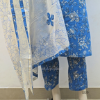 Sky blue premium kantha cotton churidar set with white floral print, applique yoke and cotton dupatta. Available at Beleza Calicut.