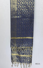 Soft gold tissue silk blend 3-piece set with gold front embroidery, matching bottom and deep navy antique gold zari dupatta.