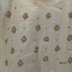 Soft gold tissue silk blend 3-piece set with gold front embroidery, matching bottom and deep navy antique gold zari dupatta.