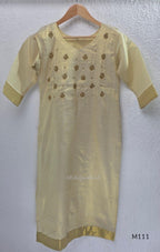 Soft gold tissue silk blend 3-piece set with gold front embroidery, matching bottom and deep navy antique gold zari dupatta.