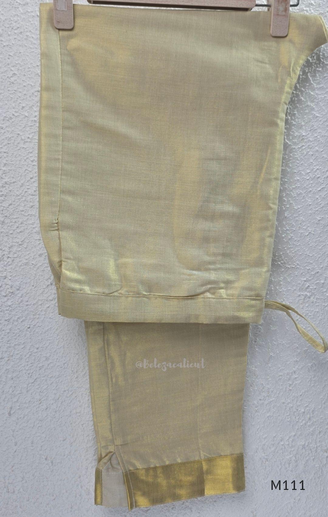 Soft gold tissue silk blend 3-piece set with gold front embroidery, matching bottom and deep navy antique gold zari dupatta.