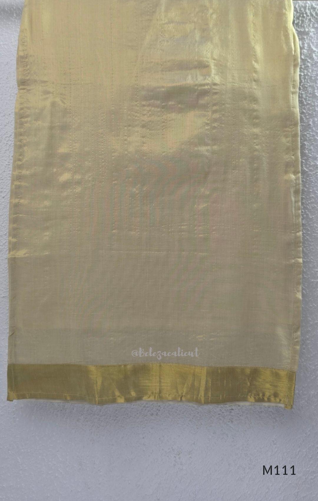 Soft gold tissue silk blend 3-piece set with gold front embroidery, matching bottom and deep navy antique gold zari dupatta.