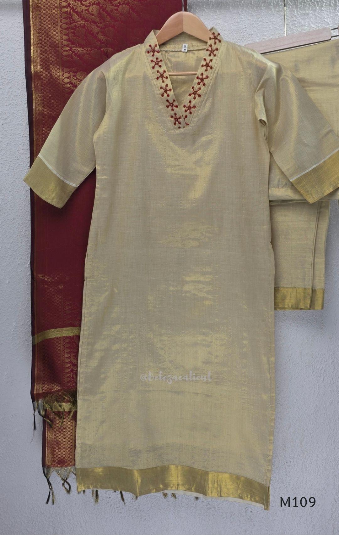 Soft gold tissue silk blend 3-piece set with red neckline bead work, matching bottom and deep maroon antique gold zari dupatta.