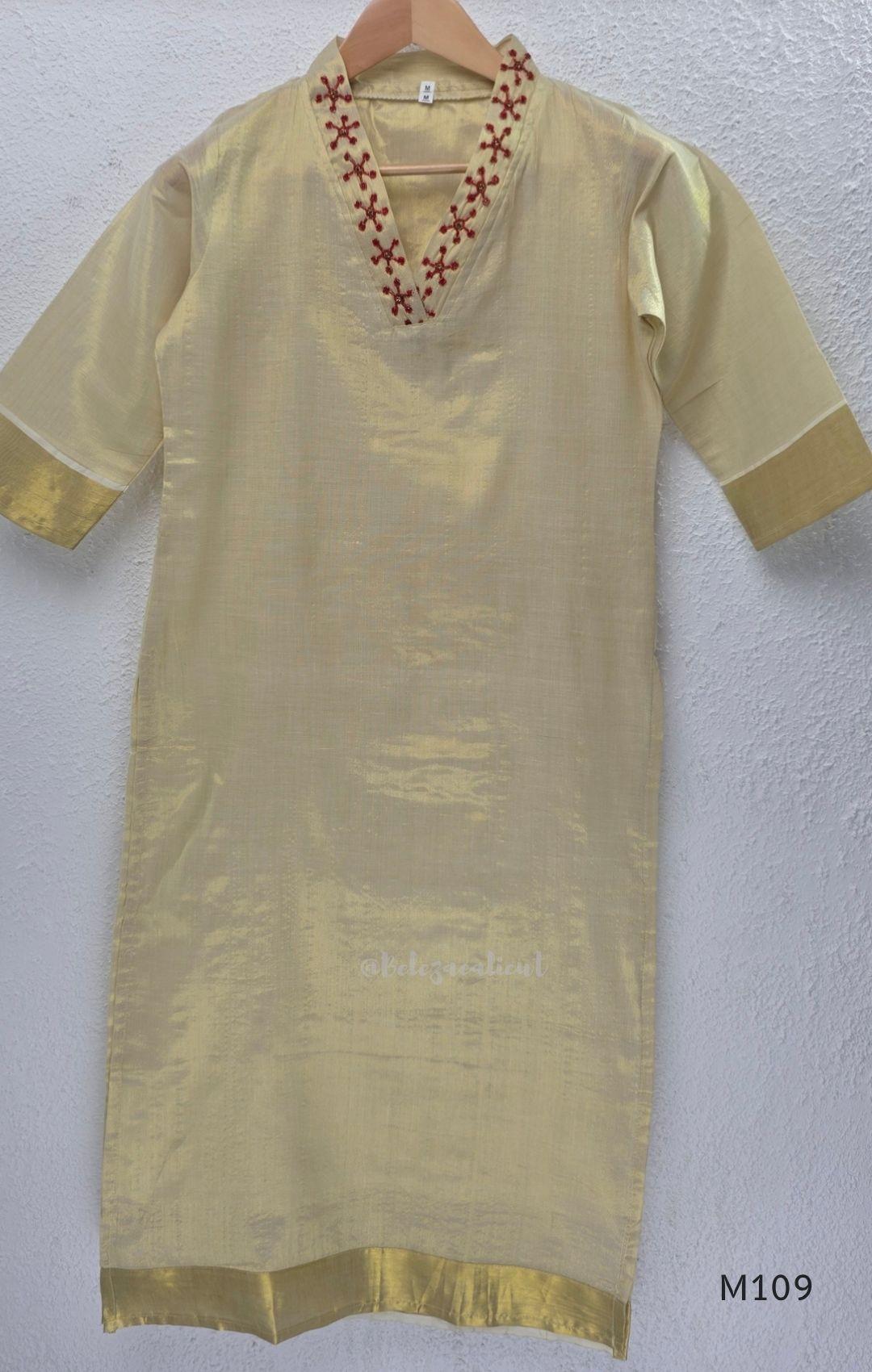 Soft gold tissue silk blend 3-piece set with red neckline bead work, matching bottom and deep maroon antique gold zari dupatta.