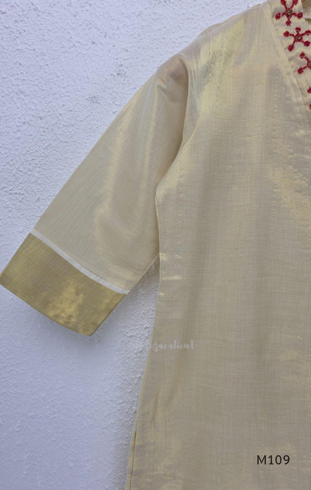 Soft gold tissue silk blend 3-piece set with red neckline bead work, matching bottom and deep maroon antique gold zari dupatta.