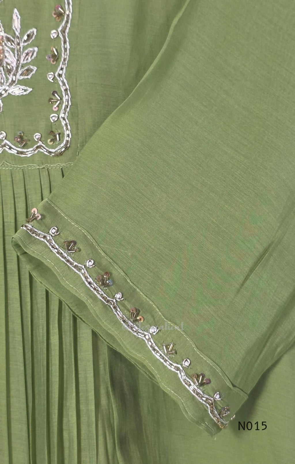 Soft olive green Mul Chanderi full churidar set with embroidered A-line kurta, straight-leg pants and matching embroidered dupatta.