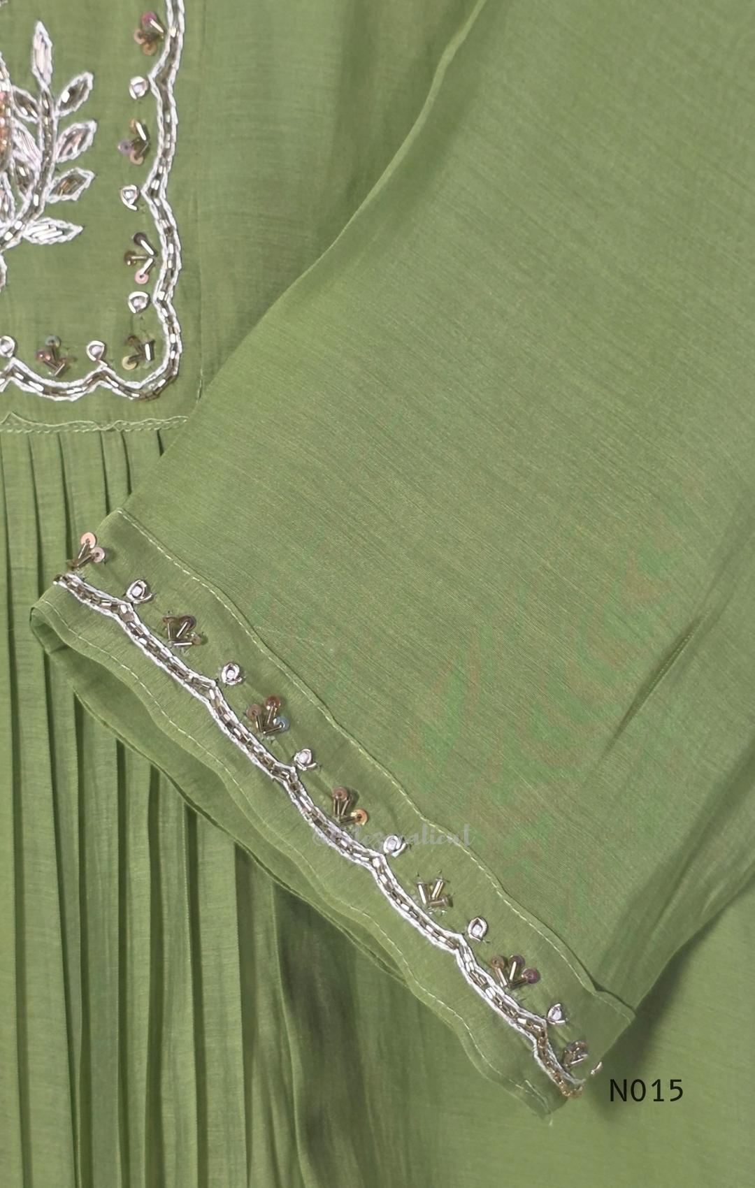 Soft olive green Mul Chanderi full churidar set with embroidered A-line kurta, straight-leg pants and matching embroidered dupatta.