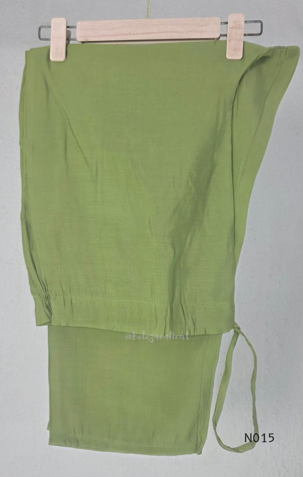 Soft olive green Mul Chanderi full churidar set with embroidered A-line kurta, straight-leg pants and matching embroidered dupatta.