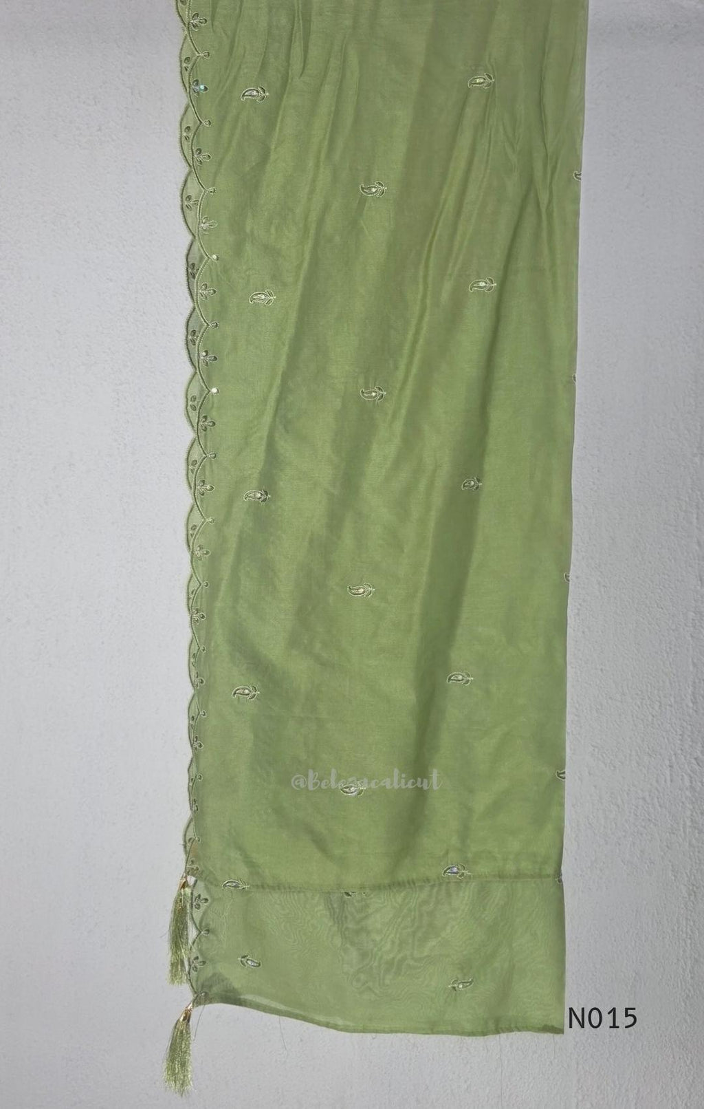 Soft olive green Mul Chanderi full churidar set with embroidered A-line kurta, straight-leg pants and matching embroidered dupatta.