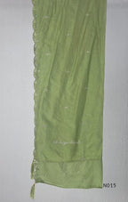 Soft olive green Mul Chanderi full churidar set with embroidered A-line kurta, straight-leg pants and matching embroidered dupatta.