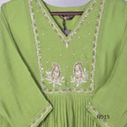 Soft olive green Mul Chanderi full churidar set with embroidered A-line kurta, straight-leg pants and matching embroidered dupatta.