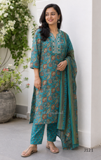 Teal blue Jaipur cotton churidar set with floral print, mirror-work neckline, matching printed bottom and dupatta.