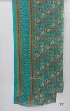Teal blue Jaipur cotton churidar set with floral print, mirror-work neckline, matching printed bottom and dupatta.
