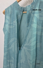 eal blue rayon blend 2-piece set with leaf line print, high neck top, back zip and matching printed straight pant.