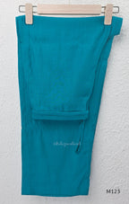eal blue Vertigan silk coord set with white floral embroidery and straight pants.