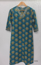 Teal green Jaipur cotton churidar set with V-neck detail, circular print, striped bottom and matching printed dupatta.