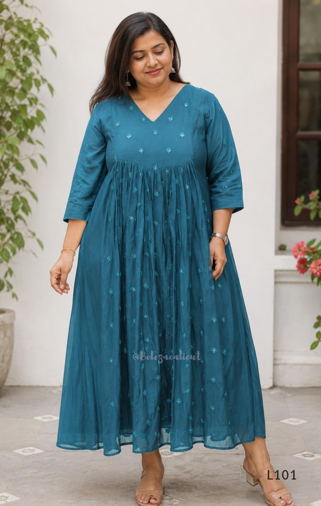 Teal mul chanderi A-line kurti with V-neck, gathered front panel, 3/4 sleeves and tonal embroidered motifs.