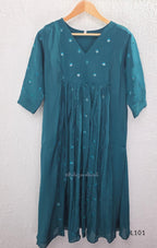 Teal mul chanderi A-line kurti with V-neck, gathered front panel, 3/4 sleeves and tonal embroidered motifs.