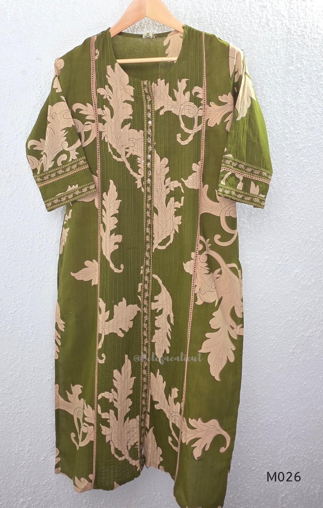 Olive green cotton 3-piece ethnic set with beige leaf print kurta, matching printed pant and dupatta.
