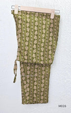 Olive green cotton 3-piece ethnic set with beige leaf print kurta, matching printed pant and dupatta.
