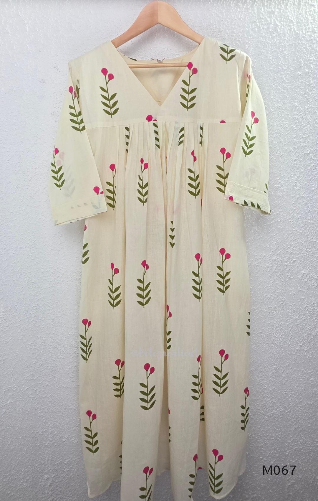 Warm ivory cotton lined 2-piece set with green stem and rose-pink blossom print, V-neckline, gathered front yoke and matching bottom.