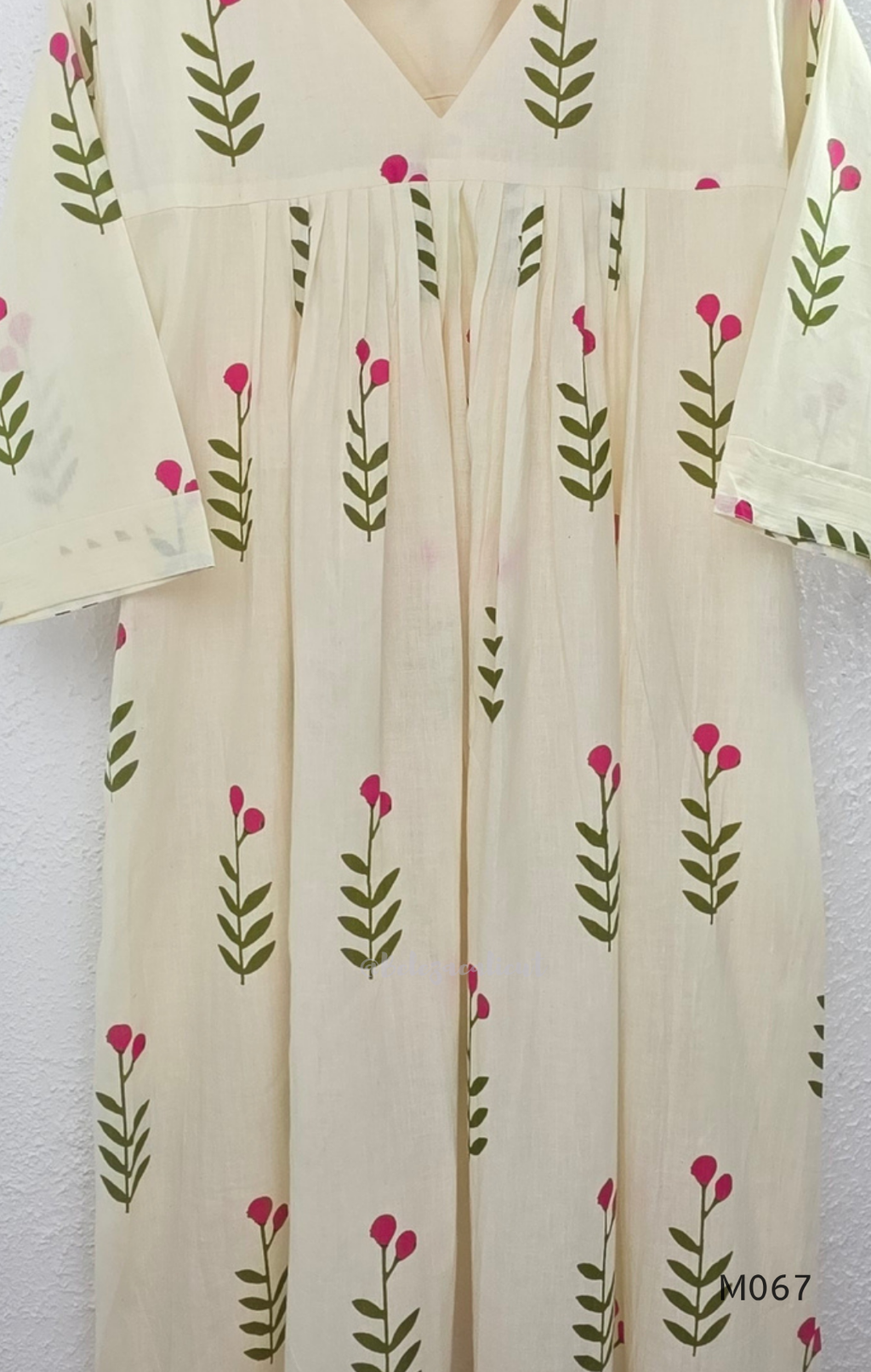 Warm ivory cotton lined 2-piece set with green stem and rose-pink blossom print, V-neckline, gathered front yoke and matching bottom.