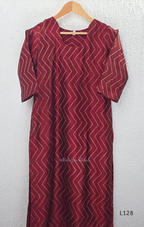 Wine maroon soft silk blend 2-piece kurti set with beige silver chevron line print, short sleeves, V neckline and matching plain bottom.