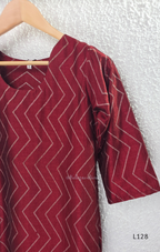 Wine maroon soft silk blend 2-piece kurti set with beige silver chevron line print, short sleeves, V neckline and matching plain bottom.
