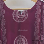  Wine Vertigan silk printed coord set with sleeveless shoulder-tie top and matching straight pants.