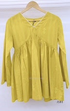 Yellow-green cotton short top with vertical dotted design, gathered flared yoke and bell sleeves.