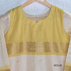 Yellow and cream tissue blend churidar set with woven gold-toned borders, scattered motifs, straight pants and matching dupatta.