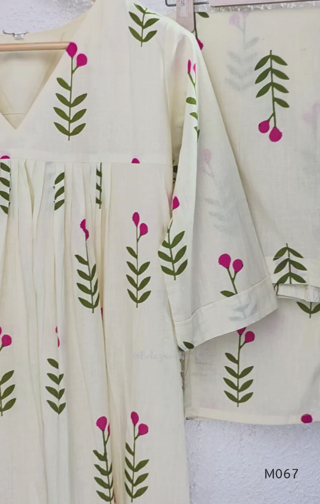 Warm ivory cotton lined 2-piece set with green stem and rose-pink blossom print, V-neckline, gathered front yoke and matching bottom.