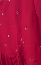 Red mul chanderi A-line kurti with V-neck, gathered front panel, 3/4 sleeves and small scattered embroidery.