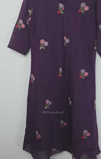 Deep purple Mul Chanderi top and bottom coord set with scattered multicolour floral embroidery.