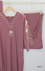 Dusty rose mul chanderi 3-piece churidar set with beige floral embroidery, scallop dupatta border, relaxed fit.